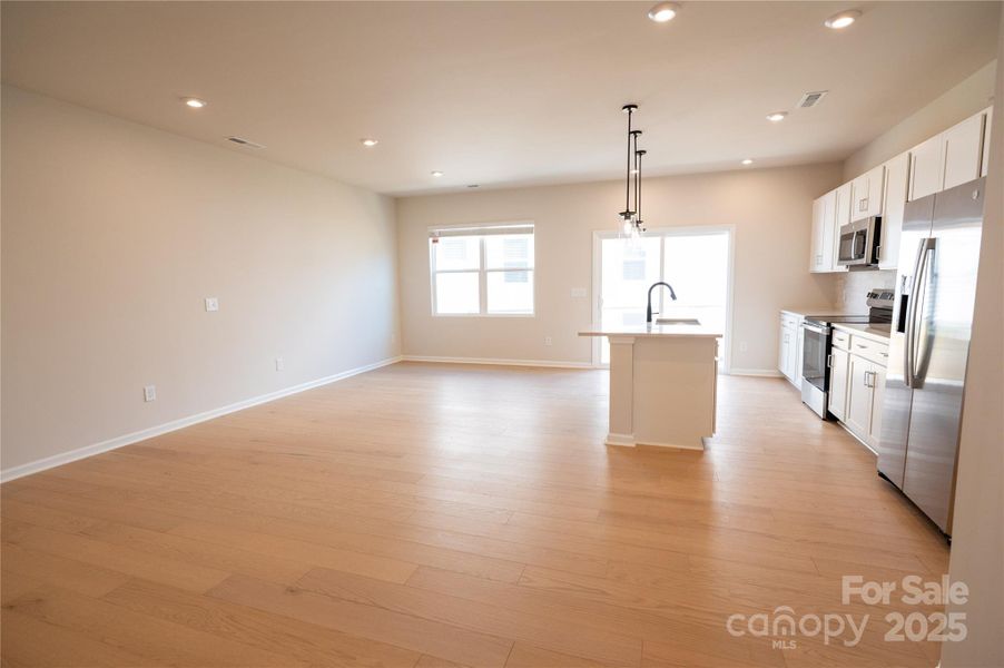 Durable and easy to maintain flooring throughout the first floor.