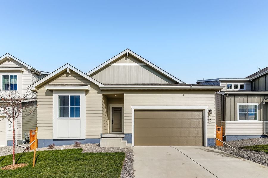 Front exterior of a new home in Brighton Crossings, Brighton, CO, highlighting curb appeal (Image 1). Front exterior of a new home in Brighton Crossings, Brighton, CO, highlighting curb appeal (Image 1).