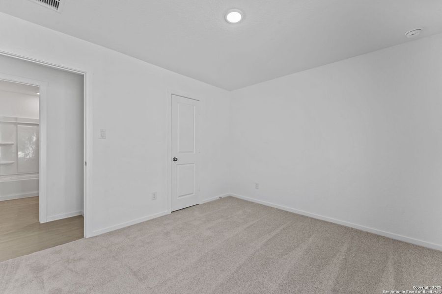 Spacious, unfurnished interior of a new home in Randolph Crossing: Cottage Collection, Converse (Image 15).