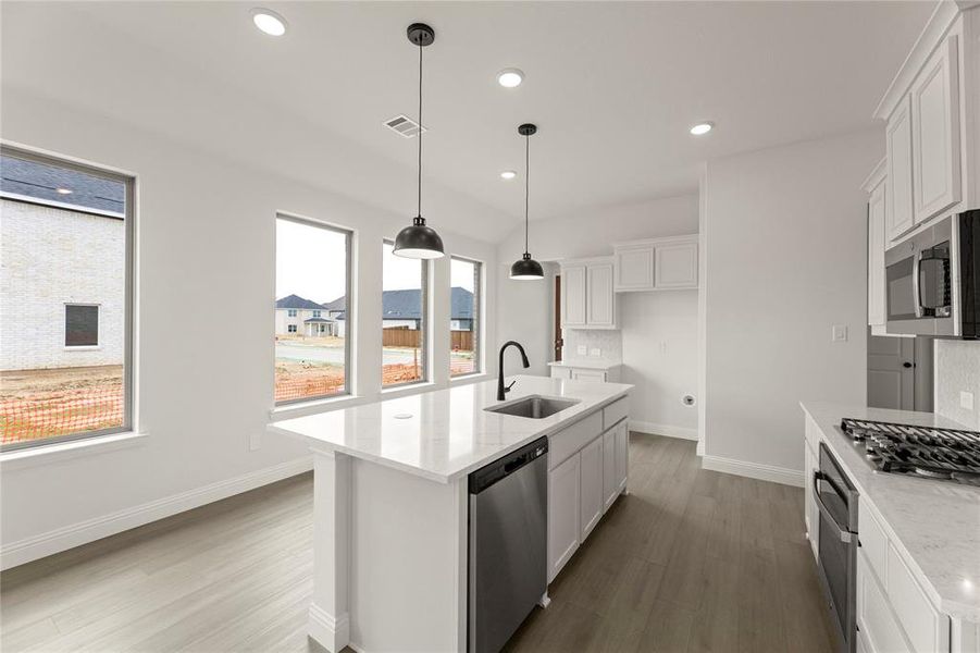 Furnished interior view inside a new home in La Terra at Uptown Celina, Celina (Image 7). Furnished interior view inside a new home in La Terra at Uptown Celina, Celina (Image 7).