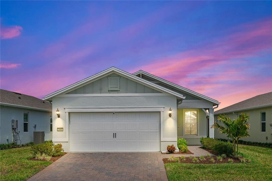 Front exterior of a new home in , St. Cloud, FL, highlighting curb appeal (Image 19).