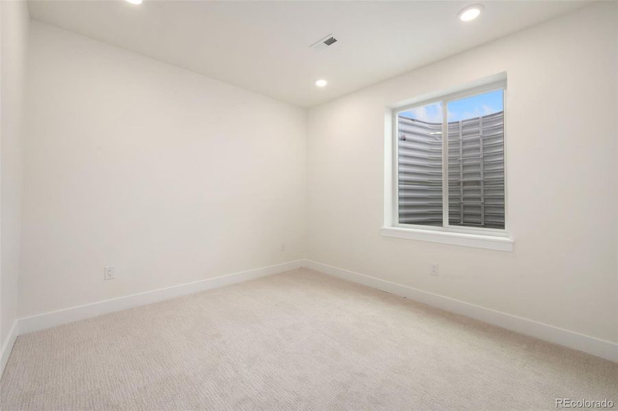 Spacious, unfurnished interior of a new home in Festival at RainDance, Windsor (Image 12).