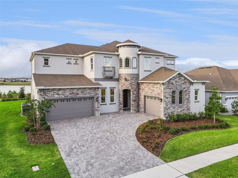 Front exterior of a new home in , Winter Garden, FL, highlighting curb appeal (Image 27).