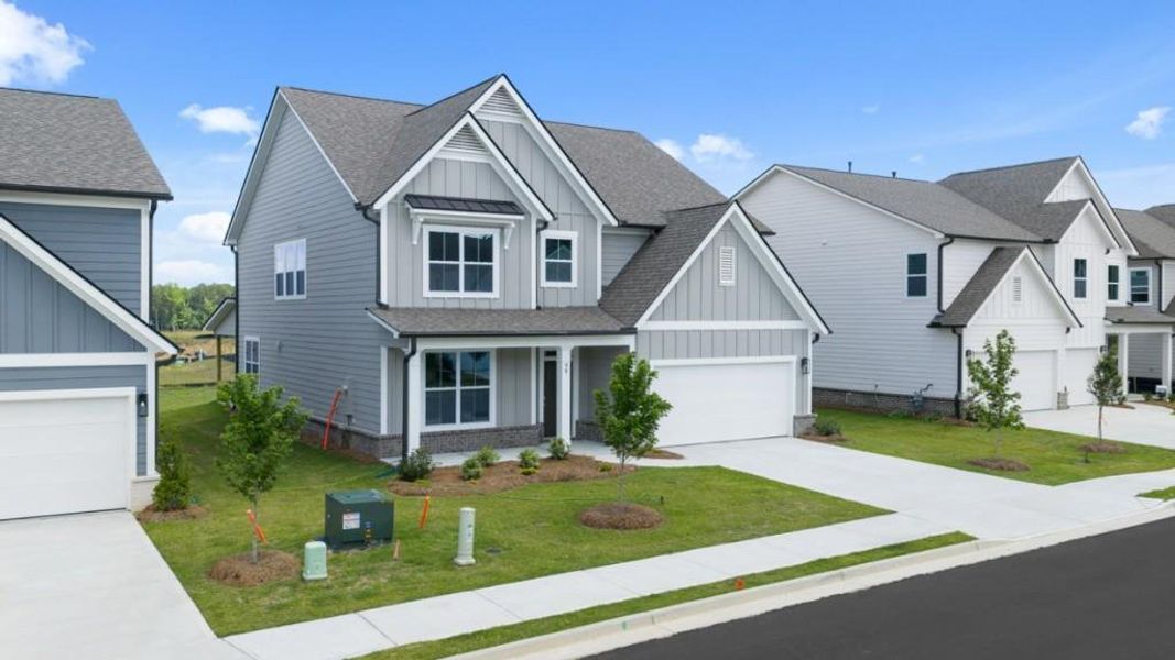 Front exterior of a new home in Hamptons at Riverwood East, Dallas, GA, highlighting curb appeal (Image 30).
