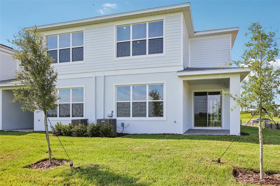Front exterior of a new home in Isla Mirada, San Antonio, FL, highlighting curb appeal (Image 25).