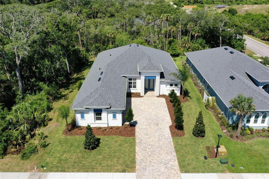 Front exterior of a new home in , Palm Coast, FL, highlighting curb appeal (Image 30). Front exterior of a new home in , Palm Coast, FL, highlighting curb appeal (Image 30).
