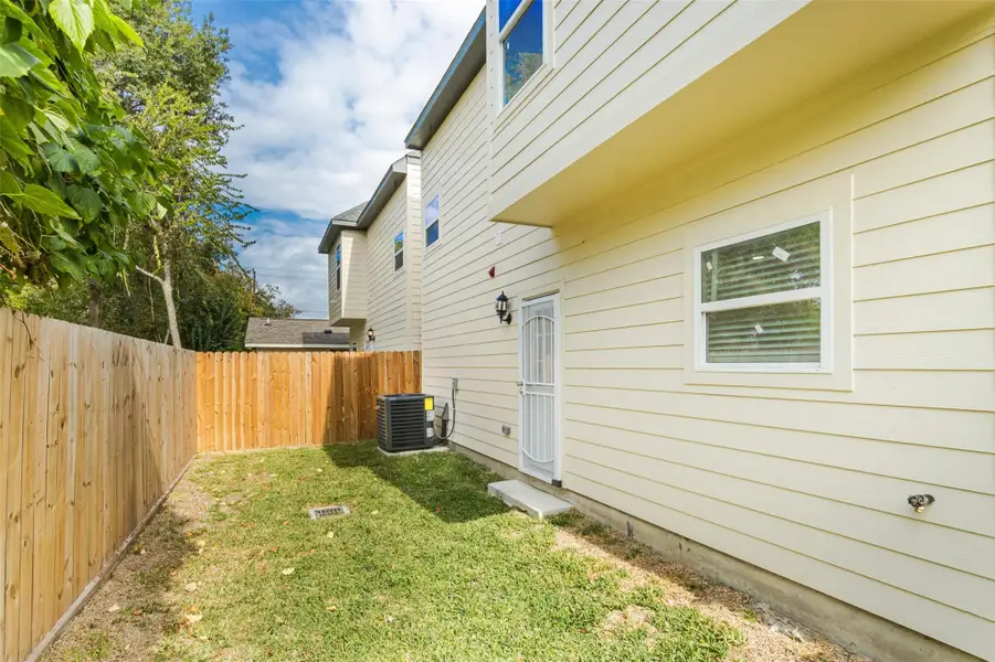 Exterior details and patio area of a home in , Houston (Image 2). Exterior details and patio area of a home in , Houston (Image 2).