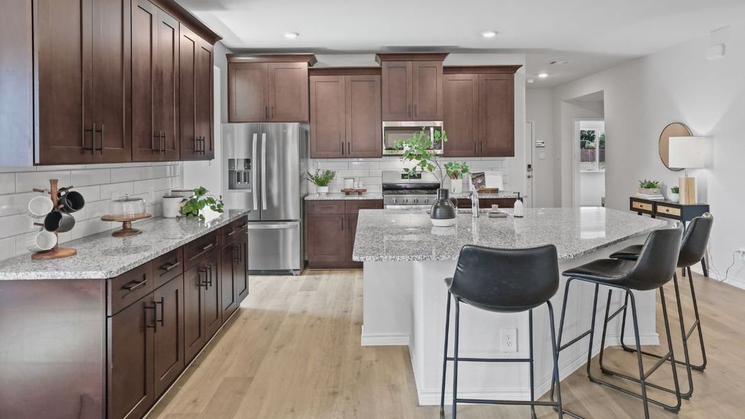 Furnished interior view inside a new home in Prairie Oaks, Oak Point (Image 8).