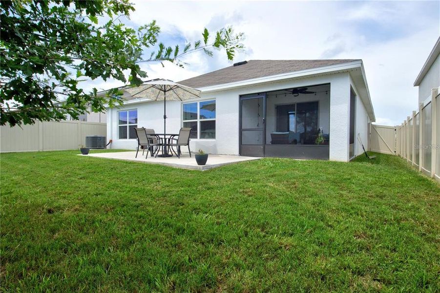 Exterior details and patio area of a home in , Zephyrhills (Image 25).