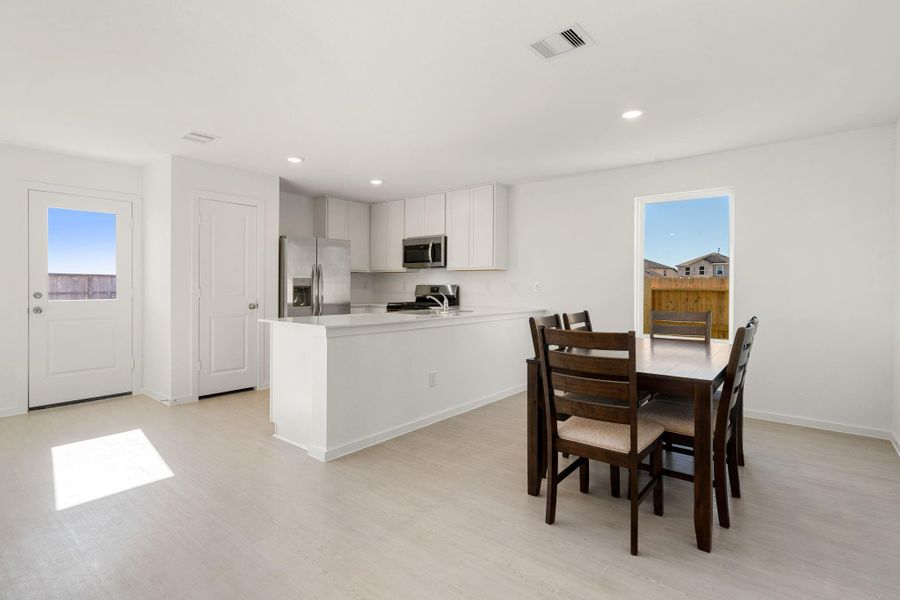 Furnished interior view inside a new home in Emberly: Cottage Collection, Beasley (Image 15).