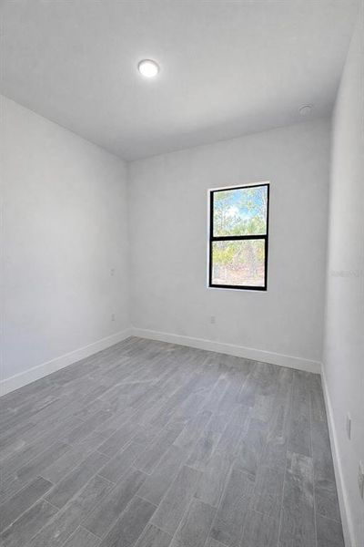 Spacious, unfurnished interior of a new home in , Port Charlotte (Image 11).