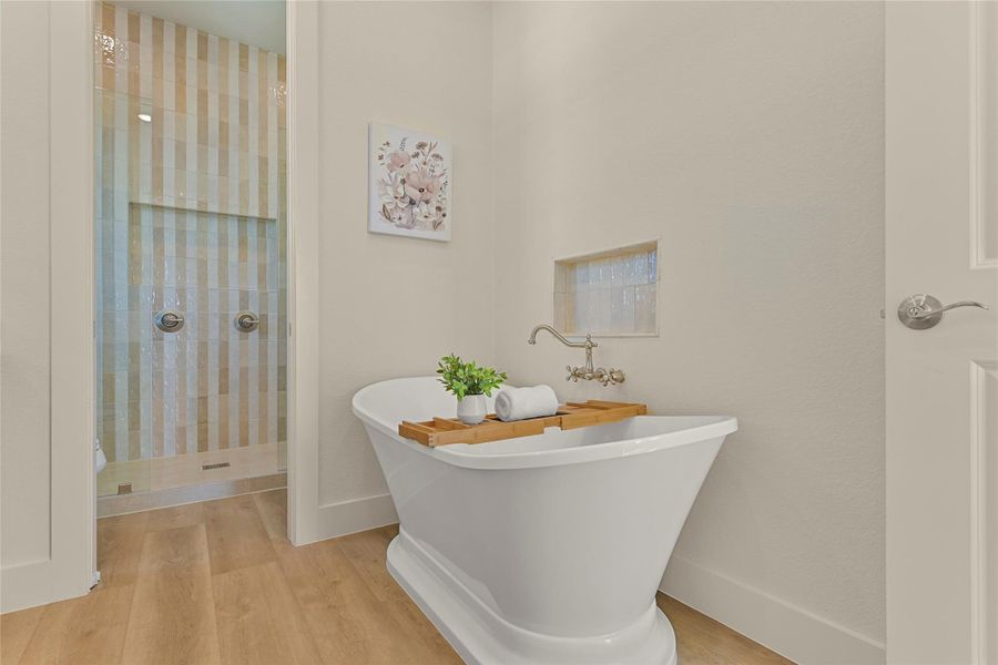 Large soaking tub with convenient built in cubby for bath essentials. Large soaking tub with convenient built in cubby for bath essentials.