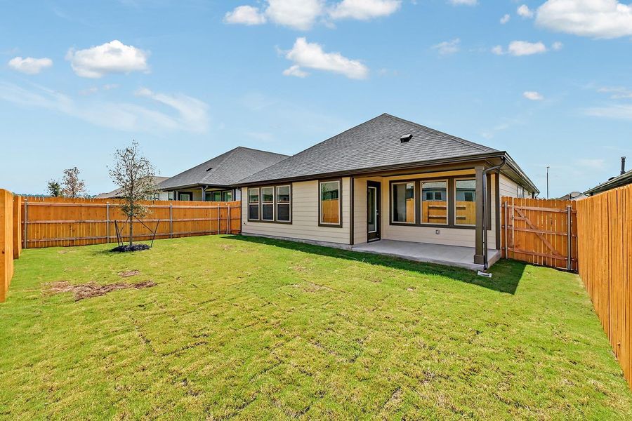 Exterior details and patio area of a home in Prairie Winds, Hutto (Image 17).
