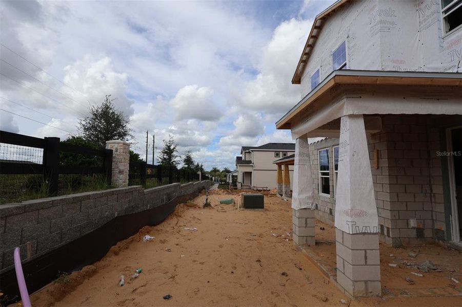 In-progress construction of a new home in Lake Star at Ovation, Winter Garden, FL (Image 16).