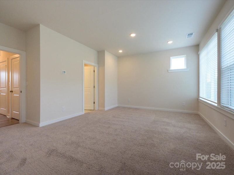 Spacious, unfurnished interior of a new home in Central Living at Craig, Charlotte (Image 27).
