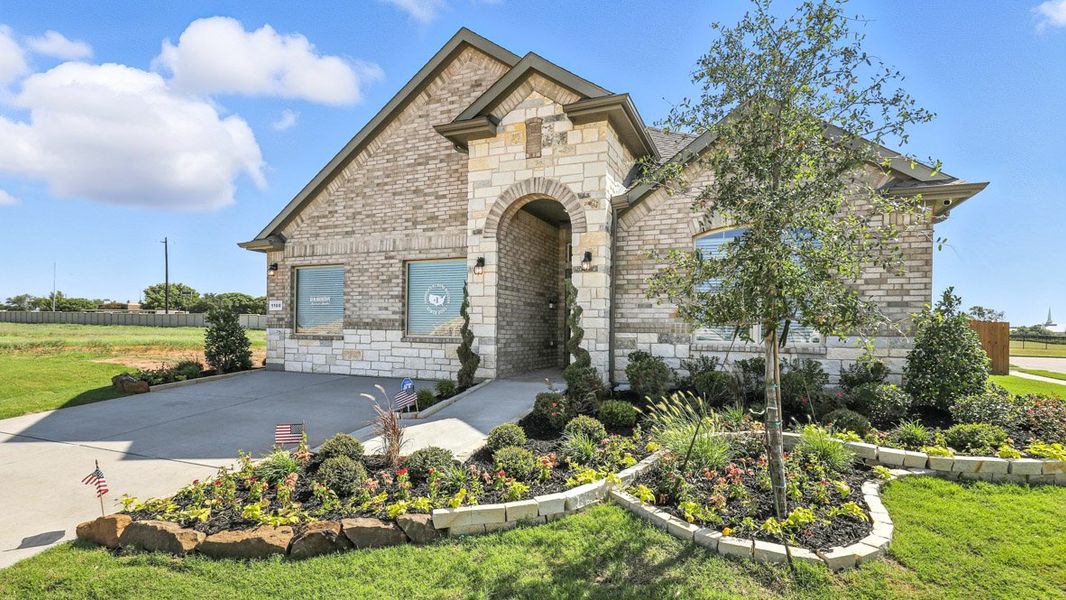 Representative exterior photo of a completed home built from the Blanco by D.R. Horton in Morningstar, Aledo, TX (Image 23).