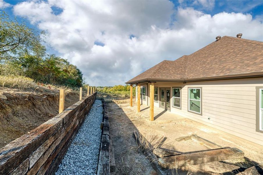 Exterior details and patio area of a home in , Runaway Bay (Image 3). Exterior details and patio area of a home in , Runaway Bay (Image 3).