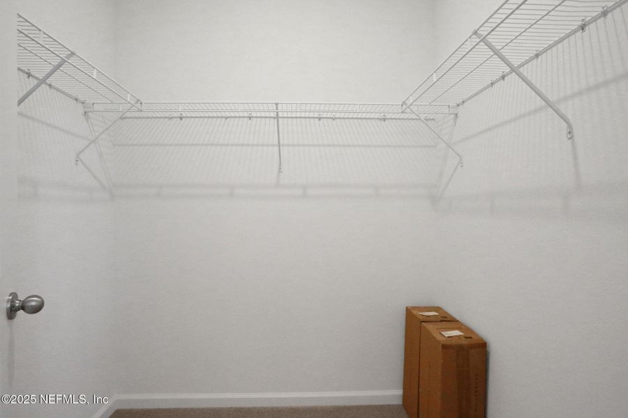 Spacious, unfurnished interior of a new home in TrailMark, St. Augustine (Image 33).