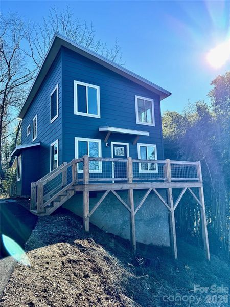 Main Entrance, front door with awning, front deck. Main Entrance, front door with awning, front deck.