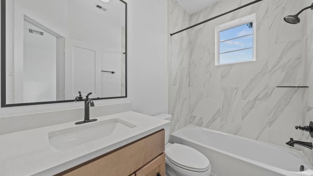 Representative furnished interior of a home built from the Rivers by Chesmar Homes in Sofi Lakes, Katy (Image 14).
