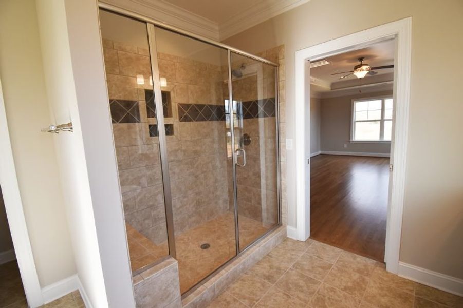 Representative furnished interior of a home built from the Lancaster by Keystone Homes NC in Preserve at Carriage Cove, Oak Ridge (Image 10).