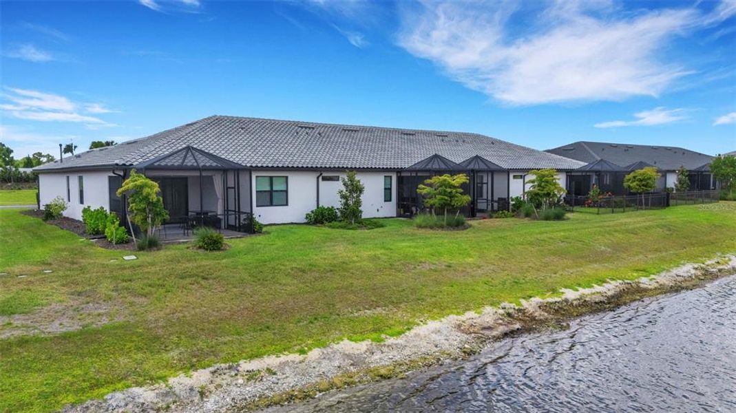 Exterior details and patio area of a home in , Nokomis (Image 36).