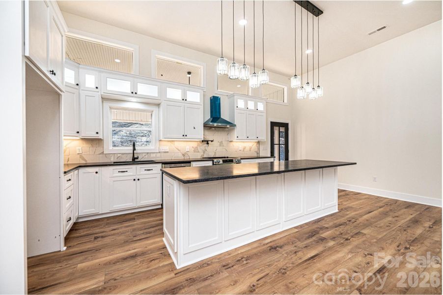 Furnished interior view inside a new home in , Lenoir (Image 8).