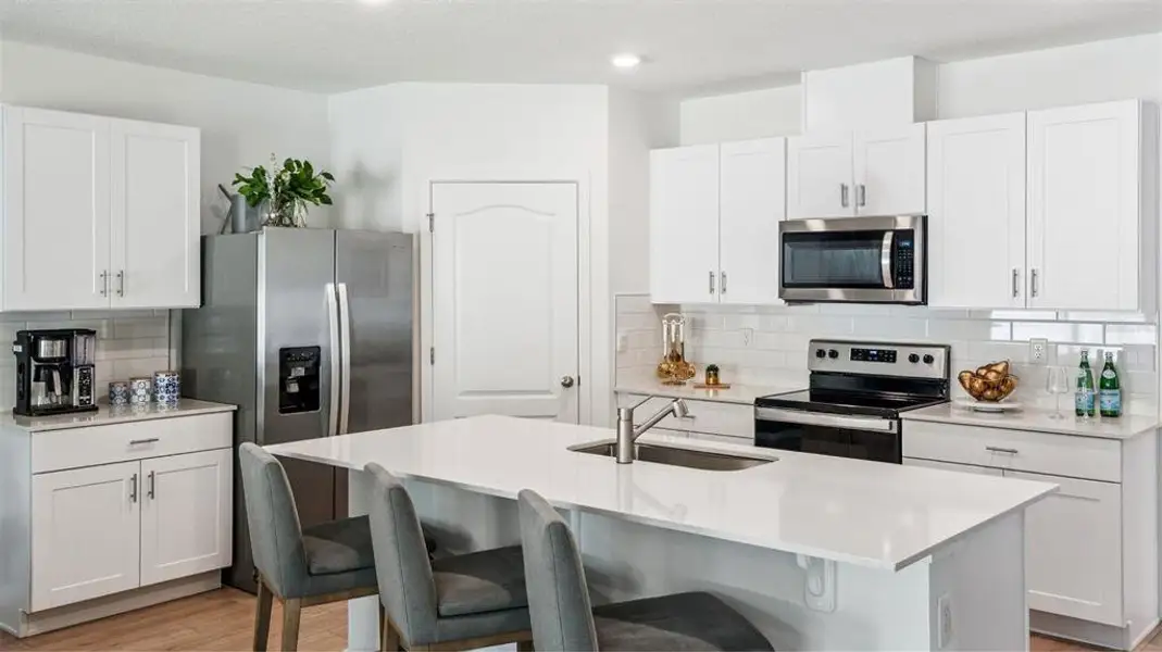 Furnished interior view inside a new home in Oak Leaf Preserve, New Smyrna Beach (Image 3).