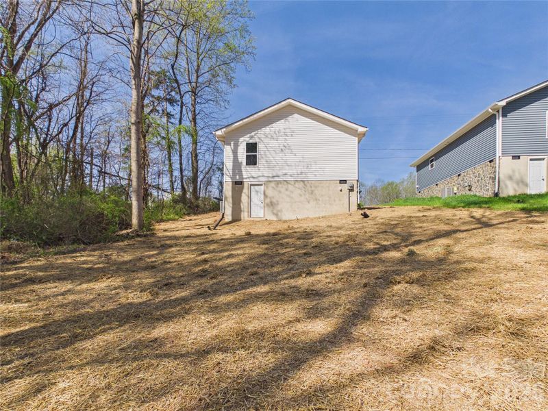 Exterior details and patio area of a home in , Valdese (Image 16).