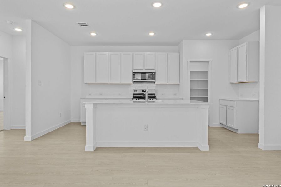 Furnished interior view inside a new home in Espada, San Antonio (Image 5).