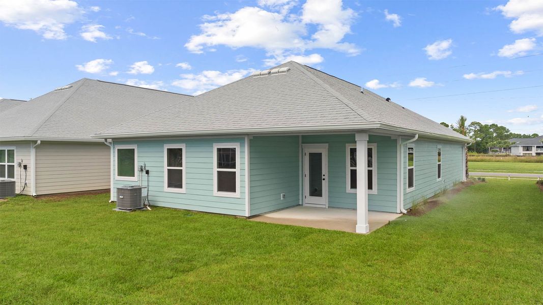 Exterior details and patio area of a home in Caballeros Estates At Hombre, Panama City Beach (Image 3).