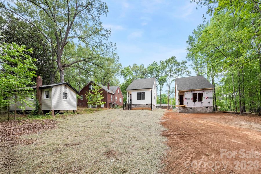 Front exterior of a new home in , Albemarle, NC, highlighting curb appeal (Image 22).