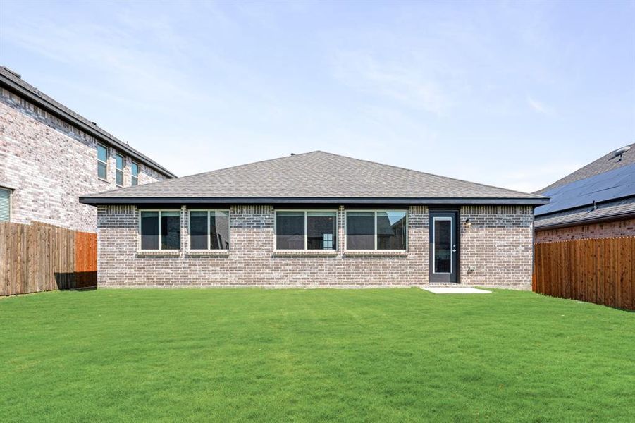 Front exterior of a new home in Godley Ranch Elements, Godley, TX, highlighting curb appeal (Image 23).