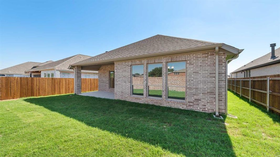 Exterior details and patio area of a home in Avondale 45', Fate (Image 4). Exterior details and patio area of a home in Avondale 45', Fate (Image 4).
