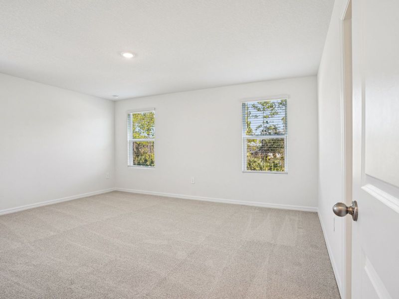 Spacious, unfurnished interior of a new home in The Meadow at Crossprairie Townes, St. Cloud (Image 11).