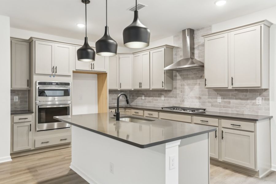 Furnished interior in a model home at Rowland's Grant in Fuquay Varina (Image 6).