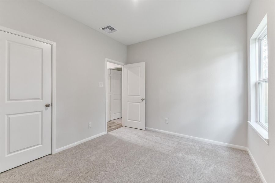 Spacious, unfurnished interior of a new home in Caney Creek Place, Conroe (Image 77).