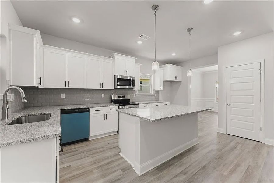 Furnished interior view inside a new home in Magnolia Villas, Cornelia (Image 6).