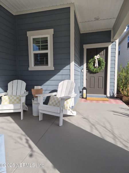 Exterior details and patio area of a home in Condo Collection at Grand Vue at Interlocken, Fernandina Beach (Image 25).