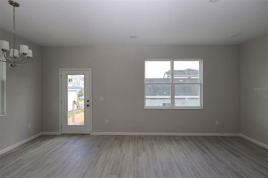 Spacious, unfurnished interior of a new home in Tribute at Ovation, Winter Garden (Image 42).