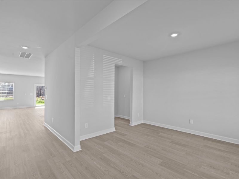 Spacious, unfurnished interior of a new home in The Farm at Wells Creek - Signature Collection, Gray Court (Image 9).