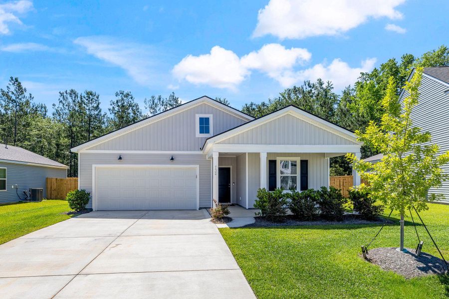 Front exterior of a new home in Bradford Pointe, Summerville, SC, highlighting curb appeal (Image 1). Front exterior of a new home in Bradford Pointe, Summerville, SC, highlighting curb appeal (Image 1).