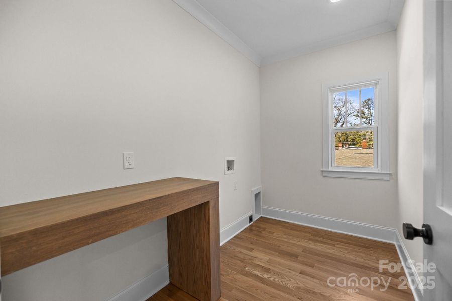 Laundry room with custom folding table