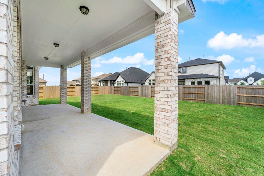 The covered patio is generously sized, providing ample space for various outdoor activities. The covered patio is generously sized, providing ample space for various outdoor activities.