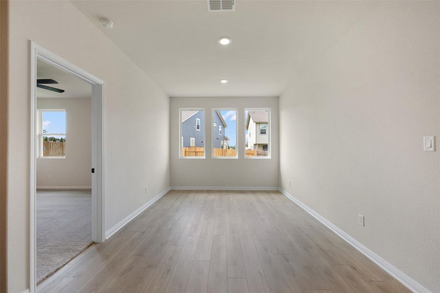 Spacious, unfurnished interior of a new home in Cannon Ranch, Dripping Springs (Image 13).
