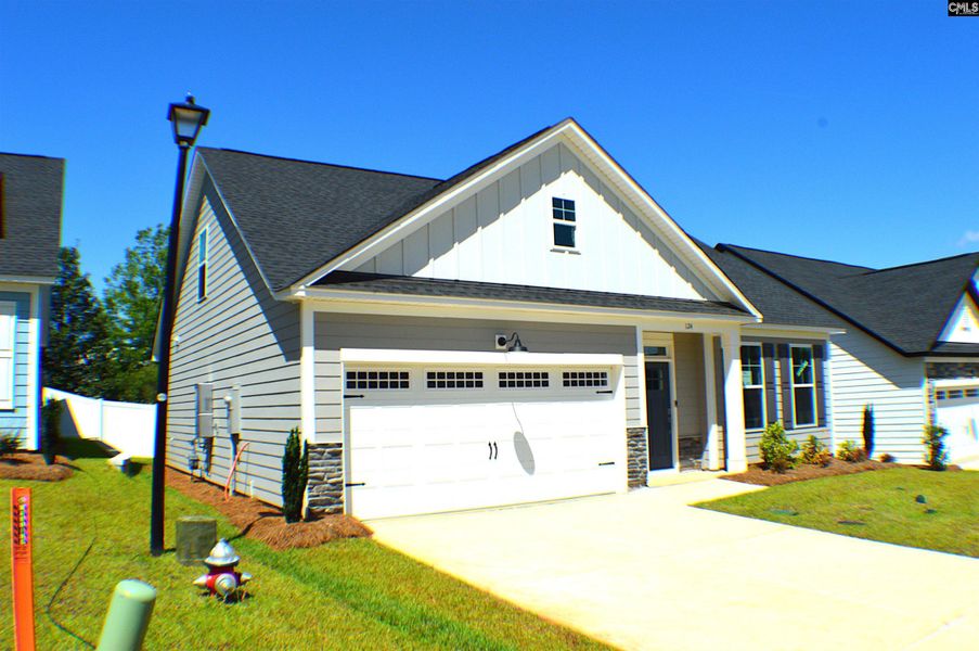 Front exterior of a new home in Bickley Station, Irmo, SC, highlighting curb appeal (Image 19).