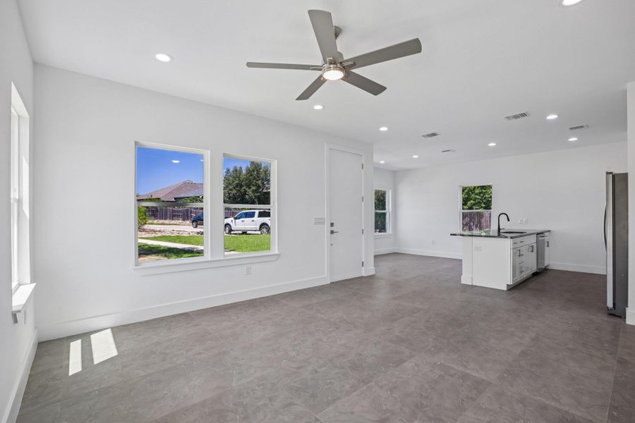 An open floor plan connects the main living space directly to the kitchen area.