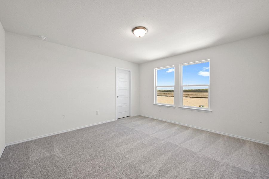 Spacious, unfurnished interior of a new home in Stoney Chase, Del Valle (Image 27).