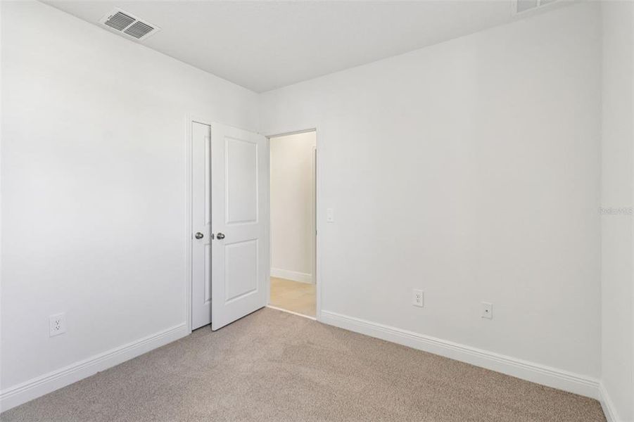 Spacious, unfurnished interior of a new home in The Reserve at Hammock Oaks - Classic Series, Lady Lake (Image 25). Spacious, unfurnished interior of a new home in The Reserve at Hammock Oaks - Classic Series, Lady Lake (Image 25).