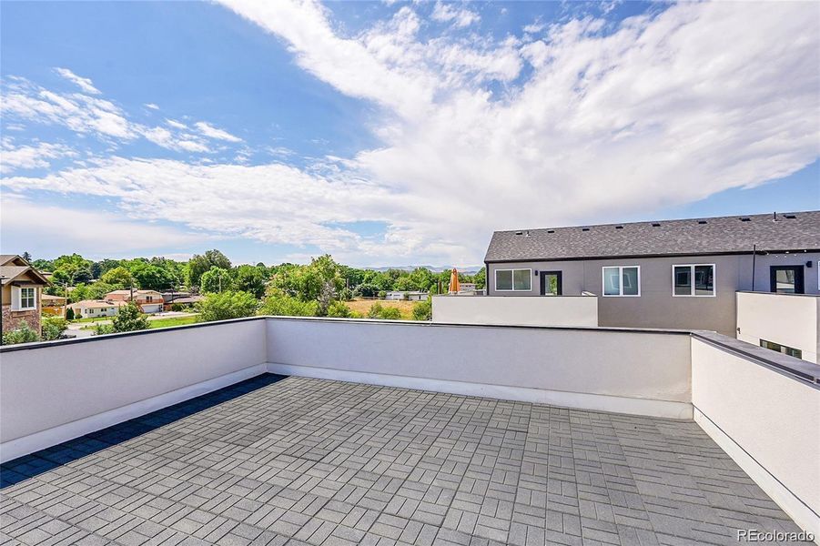 Expansive (almost 300 sq ft) rooftop deck, where you will create unforgettable memories under the open sky.